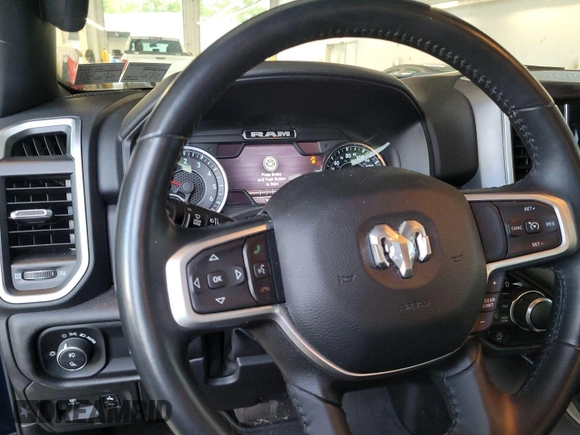 2023 Ram 1500 Big Horn with VIN 1C6RRFFG9PN574752, listed as a IAAI auction lot 42806499 with 41,735 mi miles and . Bid and sale history available at DreamBid. Image 1.