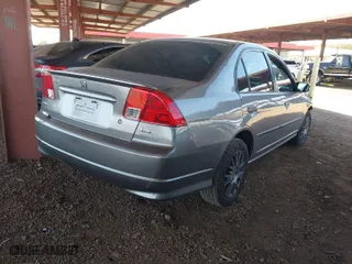 2005 Honda Civic Sdn VP with VIN 1HGES16315L005111, listed as a IAAI auction lot 42000293 with 110,373 mi miles. Bid and sale history available at carsss.com. Image 4.