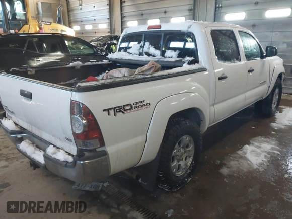 2013 Toyota Tacoma with VIN 3TMLU4EN2DM104490, listed as a IAAI auction lot 41636616 with 153,036 mi miles and . Bid and sale history available at DreamBid. Image 4.