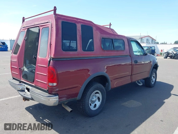 1998 Ford F-150 with VIN 1FTZF182XWKA36602, listed as a IAAI auction lot 42472442 with 112,235 mi miles and . Bid and sale history available at DreamBid. Image 4.