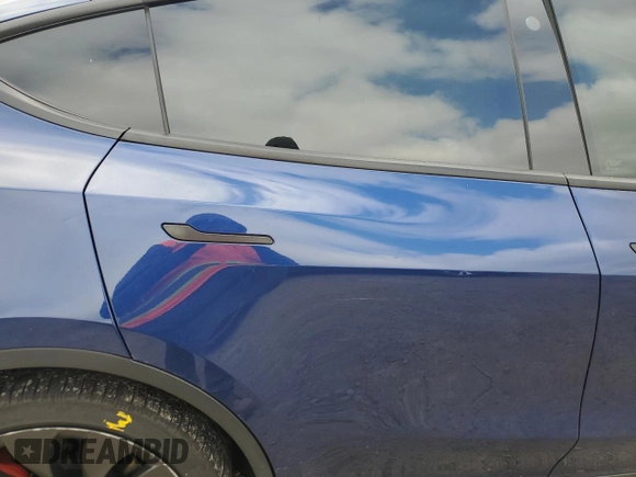 2022 Tesla Model Y Performance with VIN 7SAYGDEF4NF394472, listed as a Copart auction lot 44019665 with Not Provided miles and Non Repairable. Bid and sale history available at DreamBid. Image 11.