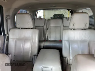 2015 Lincoln Navigator z VIN 5LMJJ2HT1FEJ07011, wystawiony jako Copart lot #59206875 z przebiegiem 251 474 mil mil oraz Czysty tytuł • Clean title. Historia ofert i sprzedaży dostępna na DreamBid. Obrazek 10.