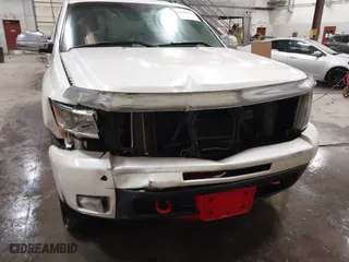 2009 Chevrolet Silverado 1500 LTZ with VIN 3GCEK33M39G177554, listed as a IAAI auction lot 41282566 with 142,356 mi miles. Bid and sale history available at carsss.com. Image 6.