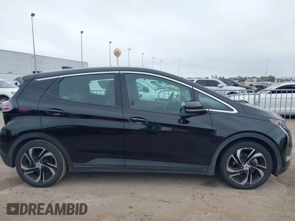 2023 Chevrolet Bolt EV 2LT z VIN 1G1FX6S02P4143467, wystawiony jako IAAI lot #41607322 z przebiegiem 95 398 mil mil oraz . Historia ofert i sprzedaży dostępna na DreamBid. Obrazek 13.