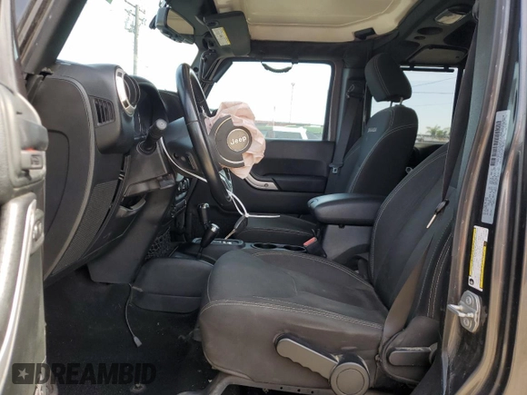 2018 Jeep Wrangler JK Unlimited Sahara with VIN 1C4HJWEG7JL921866, listed as a Copart auction lot 69345464 with 58,990 mi miles and Salvage Title. Bid and sale history available at carsss.com. Image 7.