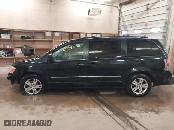 2010 Dodge Grand Caravan Crew with VIN 2D4RN6DX8AR431232, listed as a IAAI auction lot 41684591 with 142,713 mi miles and . Bid and sale history available at DreamBid. Image 15.