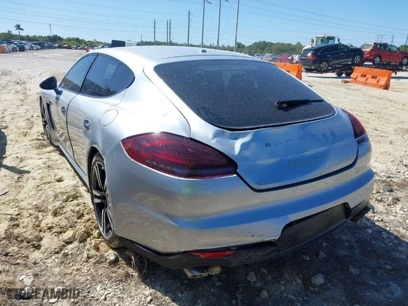2014 Porsche Panamera S E-Hybrid with VIN WP0AD2A75EL044663, listed as a IAAI auction lot 41818381 with 44,194 mi miles. Bid and sale history available at carsss.com. Image 6.