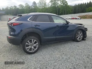 2022 Mazda CX-30 S Premium with VIN 3MVDMBDLXNM416419, listed as a Copart auction lot 54128265 with 54,838 mi miles and Salvage title. Bid and sale history available at DreamBid. Image 3.