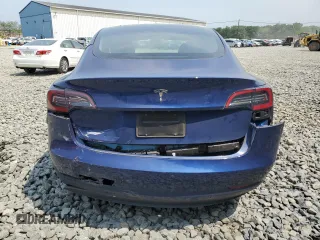2023 Tesla Model 3 z VIN 5YJ3E1EA6PF656608, wystawiony jako Copart lot #59795925 z przebiegiem 26 445 mil mil oraz Szkoda całkowita • Salvage title. Historia ofert i sprzedaży dostępna na DreamBid. Obrazek 6.