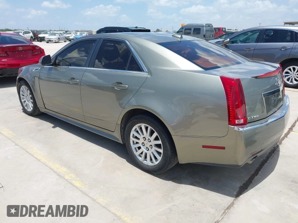 2010 Cadillac CTS Luxury with VIN 1G6DG5EG6A0148433, listed as a IAAI auction lot 42686517 with 106,701 mi miles and . Bid and sale history available at DreamBid. Image 3.