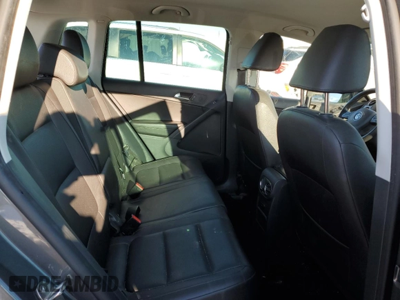2014 Volkswagen Tiguan SE z VIN WVGAV3AXXEW505398, wystawiony jako Copart lot #41682155 z przebiegiem 137 147 mil mil oraz Nie do naprawy • Non repairable. Historia ofert i sprzedaży dostępna na DreamBid. Obrazek 11.