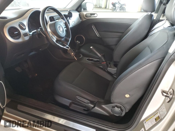 2012 Volkswagen Beetle 2.5L with VIN 3VWHX7AT5CM643314, listed as a Copart auction lot 58843455 with 72,448 mi miles and Salvage title. Bid and sale history available at DreamBid. Image 7.
