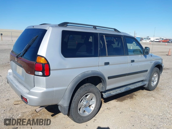 2003 Mitsubishi Montero ES z VIN JA4LS21H23J002736, wystawiony jako IAAI lot #41663572 z przebiegiem 235 704 mil mil oraz . Historia ofert i sprzedaży dostępna na DreamBid. Obrazek 4.