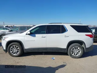 2018 Chevrolet Traverse LT Cloth z VIN 1GNERGKW9JJ214512, wystawiony jako IAAI lot #41397519 z przebiegiem 100 342 mil mil oraz . Historia ofert i sprzedaży dostępna na DreamBid. Obrazek 14.