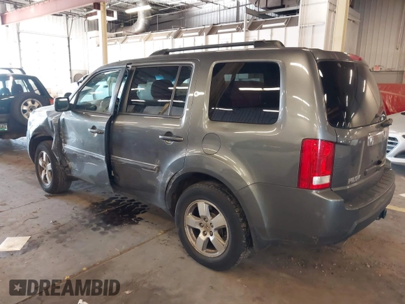 2011 Honda Pilot EX-L with VIN 5FNYF4H65BB020721, listed as a IAAI auction lot 41794436 with 113,630 mi miles and . Bid and sale history available at carsss.com. Image 3.