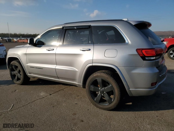 2015 Jeep Grand Cherokee Altitude with VIN 1C4RJFAG0FC136039, listed as a Copart auction lot 89237525 with 124,374 mi miles and Salvage Title. Bid and sale history available at carsss.com. Image 2.