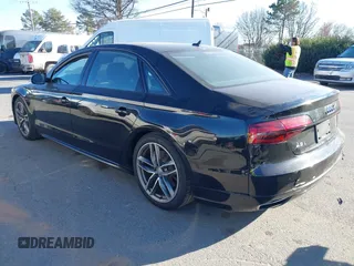 2017 Audi A8 with VIN WAU44AFD0HN017821, listed as a IAAI auction lot 41676097 with 107,378 mi miles and . Bid and sale history available at DreamBid. Image 3.