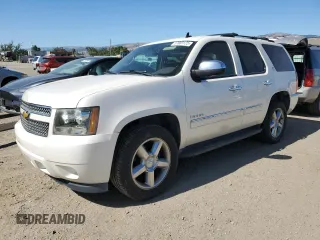 2012 Chevrolet Tahoe LTZ with VIN 1GNSKCE07CR202564, listed as a Copart auction lot 57683125 with 179,256 mi miles and Salvage title. Bid and sale history available at DreamBid. Image 1.