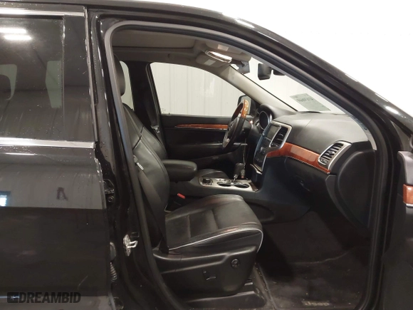 2011 Jeep Grand Cherokee Overland with VIN 1J4RR6GT7BC607735, listed as a IAAI auction lot 41830669 with 98,161 mi miles. Bid and sale history available at carsss.com. Image 5.