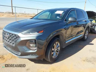 2019 Hyundai Santa Fe SE with VIN 5NMS23AD2KH134016, listed as a IAAI auction lot 41977240 with 61,448 mi miles and . Bid and sale history available at DreamBid. Image 2.