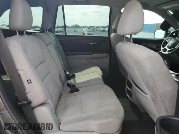 2019 Honda Pilot LX with VIN 5FNYF5H19KB016889, listed as a Copart auction lot 53972975 with 75,721 mi miles and Salvage Title. Bid and sale history available at DreamBid. Image 11.
