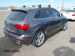 2015 Audi SQ5 Premium Plus with VIN WA1CGAFP3FA056627, listed as a IAAI auction lot 41129651 with 142,407 mi miles. Bid and sale history available at carsss.com. Image 4.