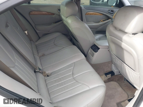 2002 Jaguar S-Type with VIN SAJDA01P12GM35163, listed as a IAAI auction lot 41097415 with 114,017 mi miles and . Bid and sale history available at DreamBid. Image 8.