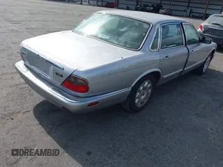 2000 Jaguar XJ with VIN SAJDA14C4YLF13470, listed as a IAAI auction lot 42136313 with 237,063 mi miles and . Bid and sale history available at DreamBid. Image 4.