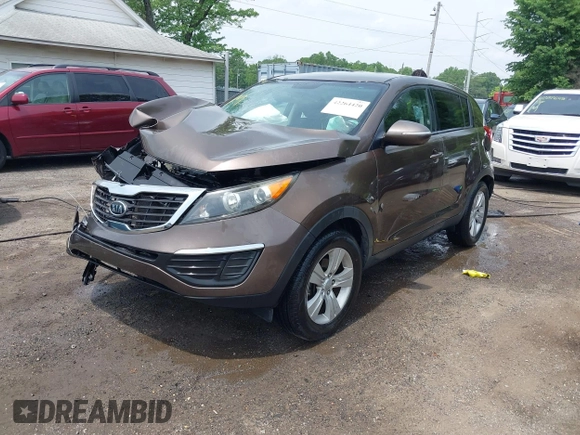 2012 Kia Sportage LX with VIN KNDPB3A20C7290990, listed as a IAAI auction lot 42264420 with 87,994 mi miles and . Bid and sale history available at DreamBid. Image 2.