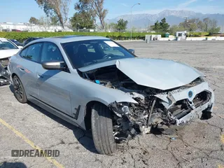2024 BMW i4 M50 z VIN WBY33AW06RFS45489, wystawiony jako IAAI lot #41981614 z przebiegiem 35 713 mil mil oraz . Historia ofert i sprzedaży dostępna na DreamBid. Obrazek 1.