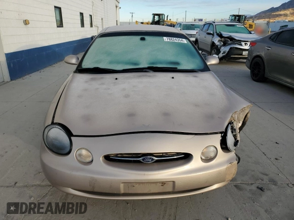 1999 Ford Taurus SE Comfort with VIN 1FAFP53S9XG126042, listed as a Copart auction lot 78824354 with 121,164 mi miles and Salvage Title. Bid and sale history available at carsss.com. Image 5.