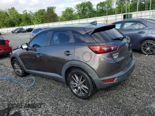 2017 Mazda CX-3 Touring z VIN JM1DKDC71H0172044, wystawiony jako Copart lot #56465125 z przebiegiem 119 374 mil mil oraz Szkoda całkowita • Salvage title. Historia ofert i sprzedaży dostępna na DreamBid. Obrazek 2.
