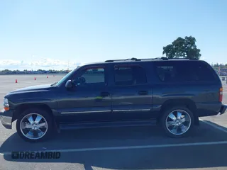2003 Chevrolet Suburban LS with VIN 3GNEC16T63G115908, listed as a IAAI auction lot 41950165 with 202,075 mi miles. Bid and sale history available at carsss.com. Image 14.