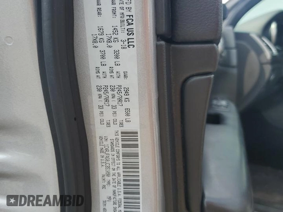 2018 Jeep Grand Cherokee Laredo E with VIN 1C4RJFAG0JC351090, listed as a Copart auction lot 52958635 with 96,956 mi miles and Salvage Title. Bid and sale history available at DreamBid. Image 14.