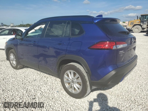 2023 Toyota Corolla Cross LE with VIN 7MUCAAAG0PV063737, listed as a Copart auction lot 86267914 with 13,740 mi miles and Salvage title. Bid and sale history available at DreamBid. Image 2.