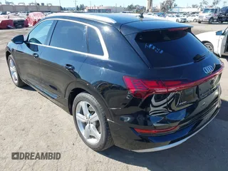 2019 Audi e-tron Premium Plus with VIN WA1LAAGE9KB021724, listed as a IAAI auction lot 41643596 with 34,804 mi miles. Bid and sale history available at carsss.com. Image 3.