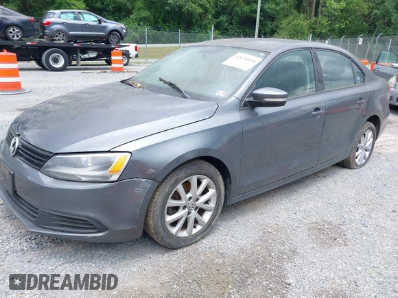 2012 Volkswagen Jetta SE with VIN 3VWDX7AJ6CM325280, listed as a IAAI auction lot 42634898 with 215,384 mi miles and . Bid and sale history available at DreamBid. Image 2.