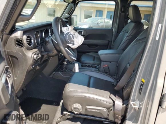 2023 Jeep Wrangler Sahara с VIN 1C4JJXP69PW698930, выставлен на аукционе Copart как лот 66679874 с пробегом 9 161 миль миль и Списание • Salvage title. История ставок и продаж доступна на DreamBid. Изображение 7.