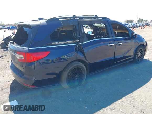 2018 Honda Odyssey EX-L z VIN 5FNRL6H79JB041040, wystawiony jako IAAI lot #41883128 z przebiegiem Nie podano mil oraz . Historia ofert i sprzedaży dostępna na DreamBid. Obrazek 4.