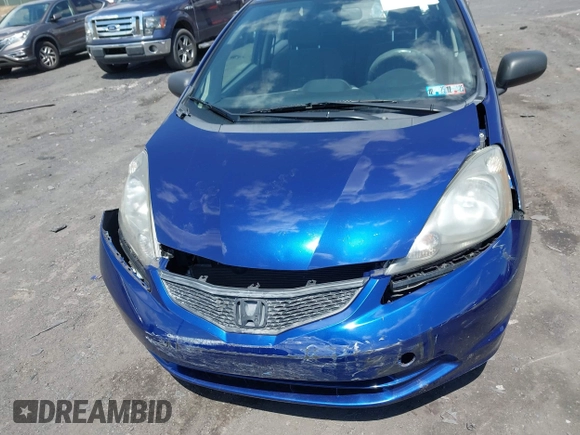 2013 Honda Fit with VIN JHMGE8H38DC047079, listed as a IAAI auction lot 42037073 with 32,794 mi miles. Bid and sale history available at carsss.com. Image 6.
