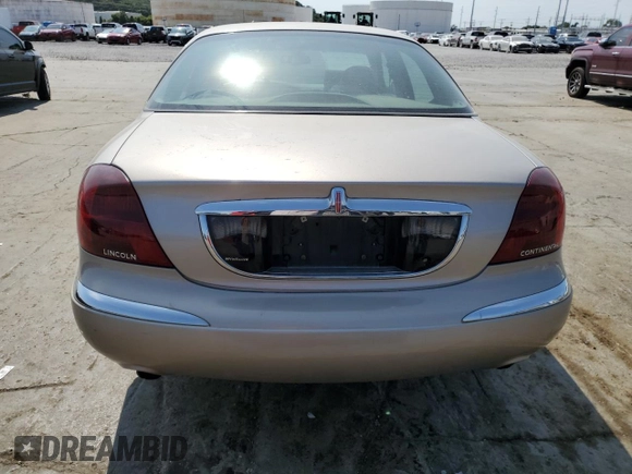2002 Lincoln Continental with VIN 1LNHM97V22Y699435, listed as a Copart auction lot 66672354 with 216,764 mi miles and Salvage Title. Bid and sale history available at carsss.com. Image 6.