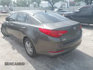 2011 Kia Optima LX with VIN KNAGM4A70B5162915, listed as a IAAI auction lot 42094325 with 156,169 mi miles and . Bid and sale history available at carsss.com. Image 3.