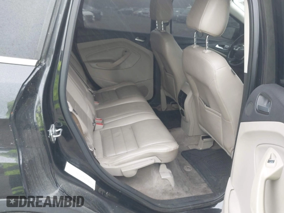 2014 Ford Escape Titanium with VIN 1FMCU9J90EUC24898, listed as a IAAI auction lot 42166523 with 152,464 mi miles and . Bid and sale history available at DreamBid. Image 8.