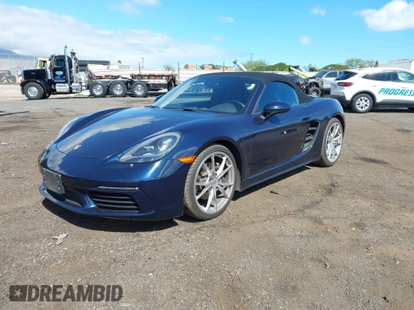 2018 Porsche 718 Boxster z VIN WP0CA2A8XJS210766, wystawiony jako IAAI lot #41617239 z przebiegiem 55 336 mil mil oraz . Historia ofert i sprzedaży dostępna na DreamBid. Obrazek 17.