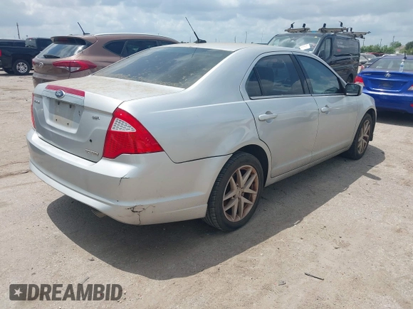 2012 Ford Fusion SEL with VIN 3FAHP0JG7CR302910, listed as a IAAI auction lot 42100004 with 215,761 mi miles. Bid and sale history available at carsss.com. Image 4.