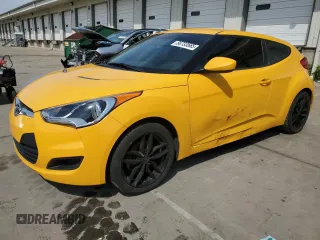 2013 Hyundai Veloster w/Gray Int z VIN KMHTC6AD5DU095190, wystawiony jako Copart lot #56733565 z przebiegiem 130 059 mil mil oraz Szkoda całkowita • Salvage title. Historia ofert i sprzedaży dostępna na DreamBid. Obrazek 1.