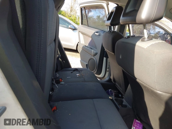 2009 Dodge Caliber SXT with VIN 1B3HB48A69D130857, listed as a IAAI auction lot 41526199 with 163,796 mi miles and . Bid and sale history available at DreamBid. Image 8.