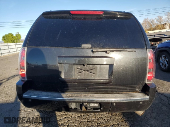 2013 GMC Yukon Denali with VIN 1GKS1EEF0DR205906, listed as a Copart auction lot 87969385 with 128,283 mi miles and Salvage Title. Bid and sale history available at carsss.com. Image 6.