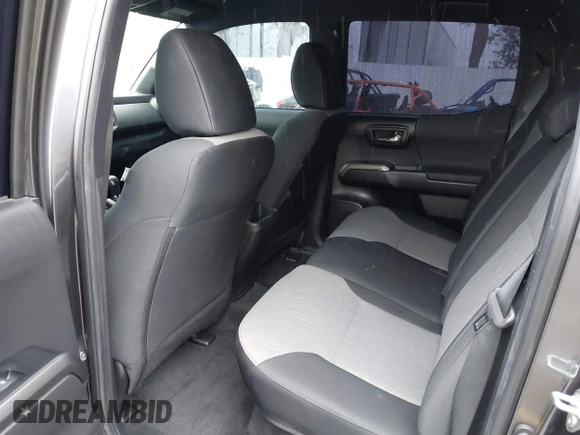 2023 Toyota Tacoma SR5 z VIN 3TMDZ5BN4PM148379, wystawiony jako IAAI lot #41547628 z przebiegiem 30 001 mil mil oraz . Historia ofert i sprzedaży dostępna na DreamBid. Obrazek 8.