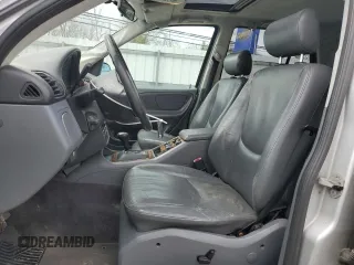 1999 Mercedes-Benz M 320/430/500 with VIN 4JGAB54E9XA127797, listed as a Copart auction lot 51408235 with 243,566 mi miles and Salvage title. Bid and sale history available at DreamBid. Image 7.